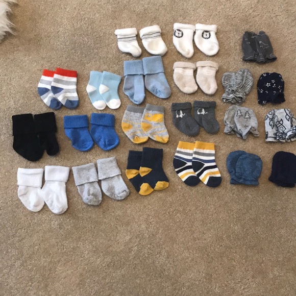 Other - 14 pair of socks and 7 pair of mittens.